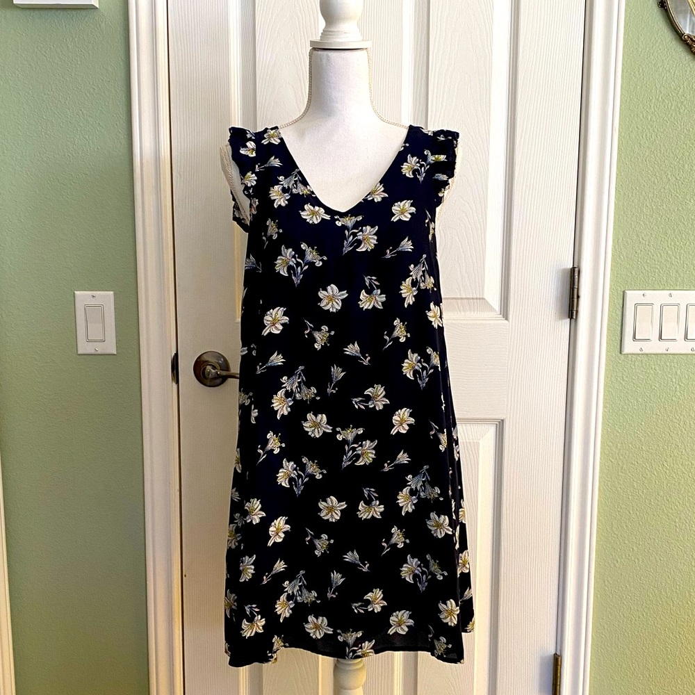 Floral sleeveless dress. Worn to a Jay-Z concert.